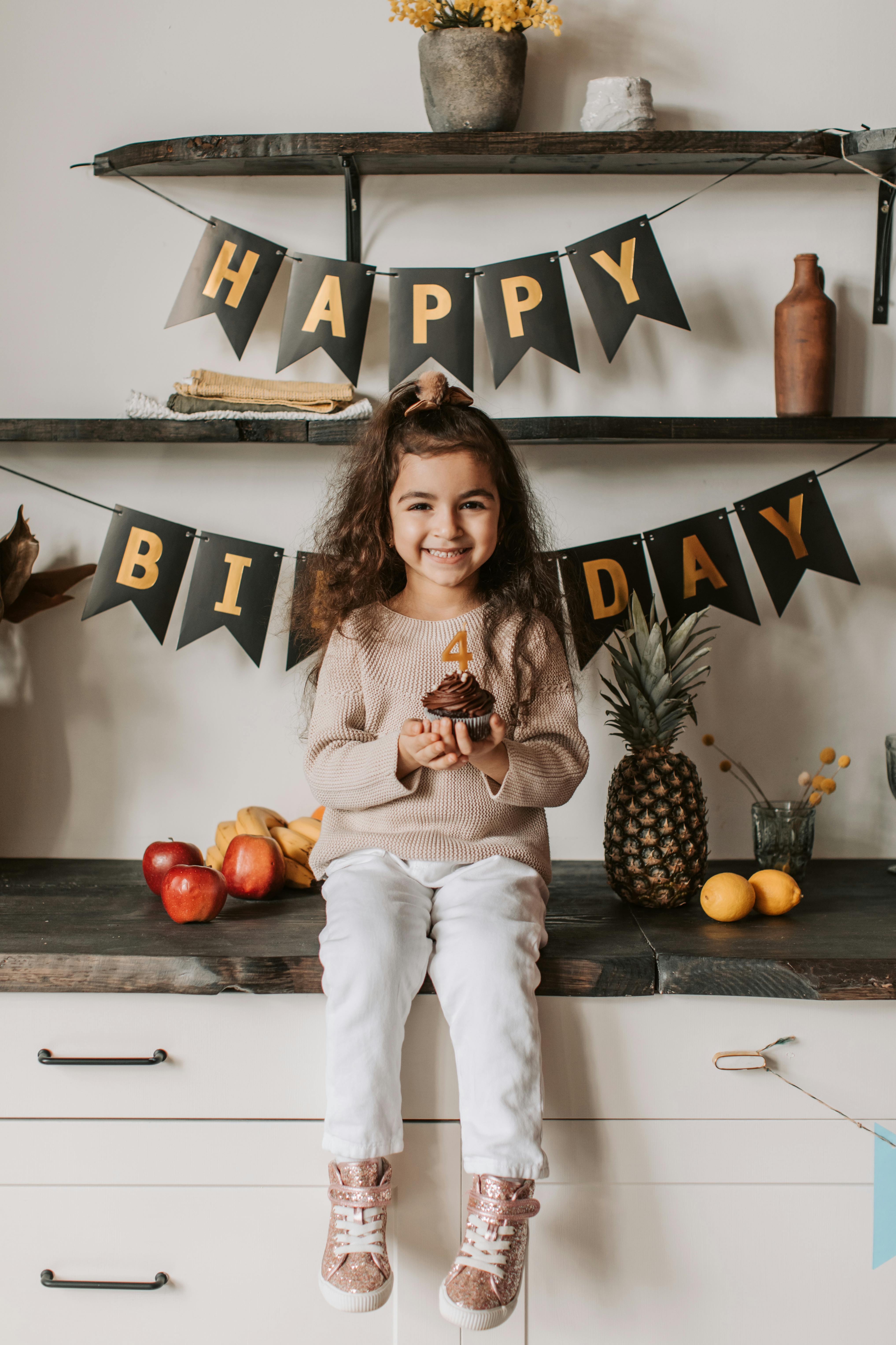 happy little girl at birthday party