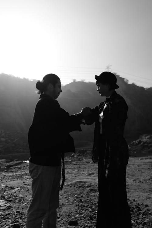 Silhouette of 2 Men Standing on Beach