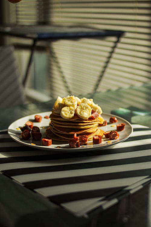 Free Close-Up Shot of a Stack of Pancakes on a Plate Stock Photo