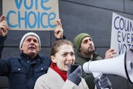 Woman Holding a Megaphone