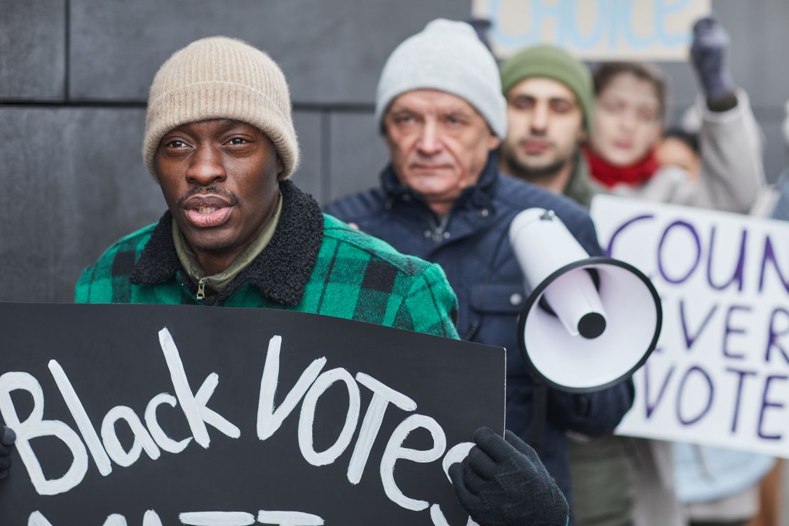 People Holding Placards while Protesting · Free Stock Photo