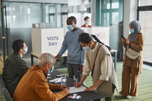 Free People Inside the Voting Precint Stock Photo