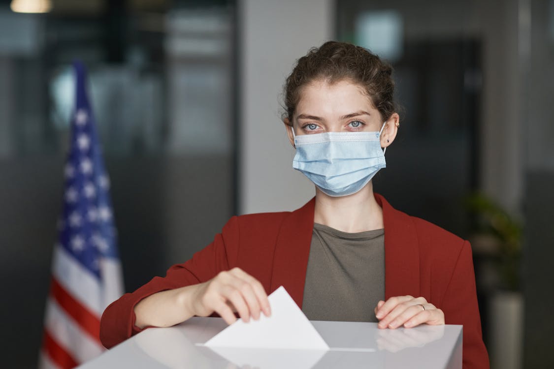 A Woman Exercising Her Right to Vote · Free Stock Photo