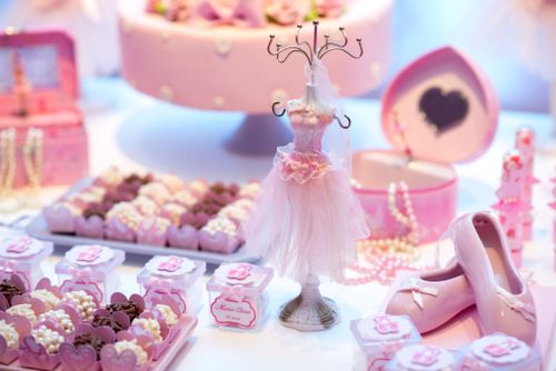 Free Elegant pink ballet themed party decoration with treats and accessories. Stock Photo