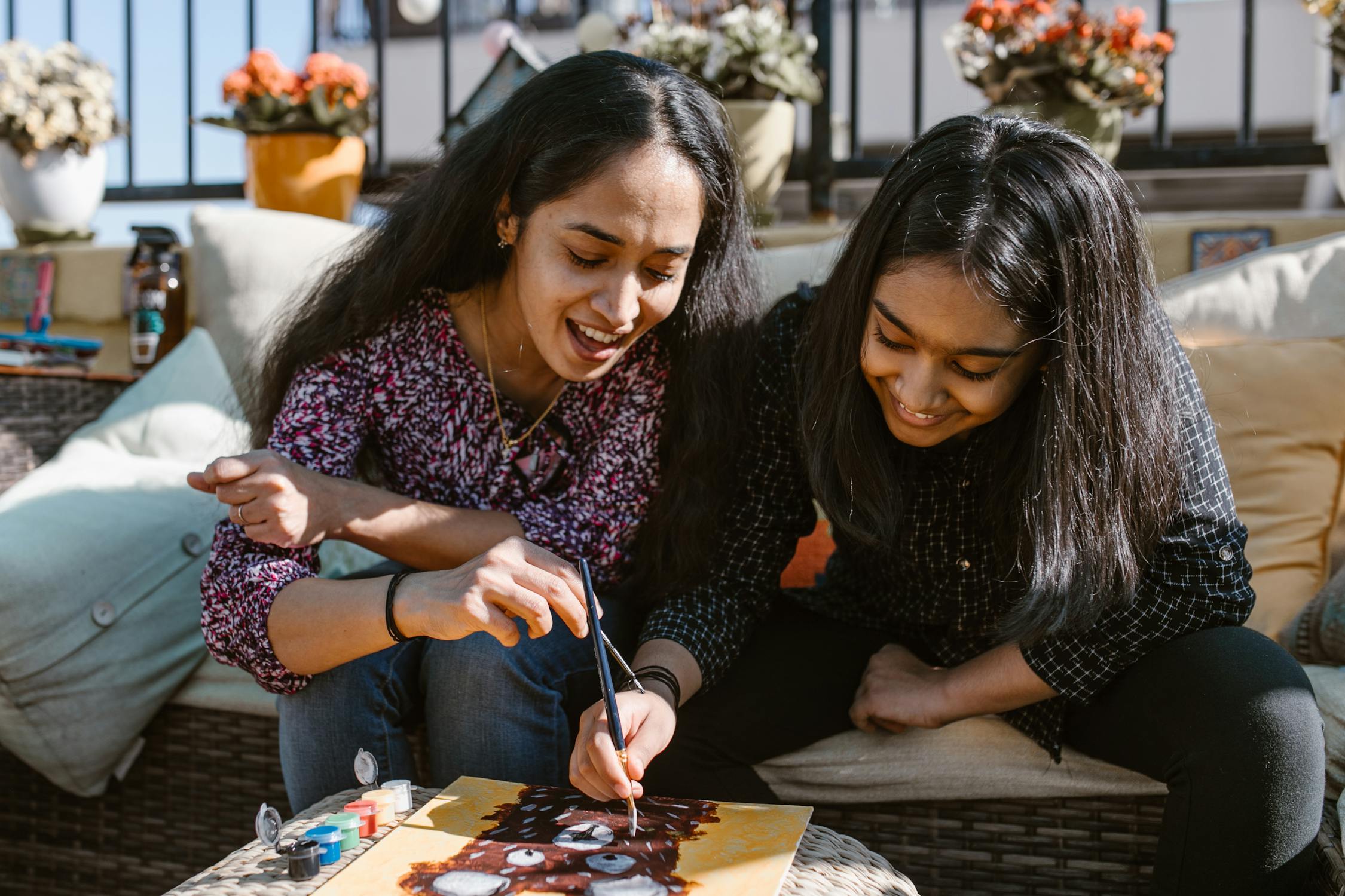 Indian Girls Photo by RODNAE Productions from Pexels: https://www.pexels.com/photo/mother-and-daughter-doing-painting-7104141/