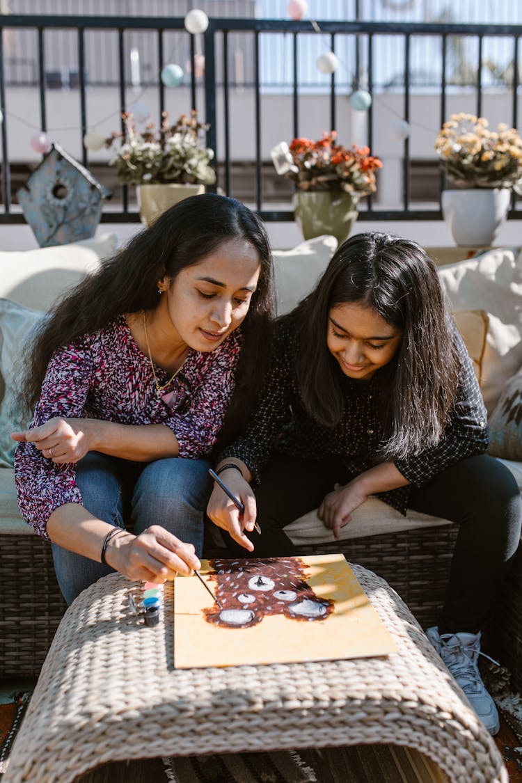 Two Women Painting