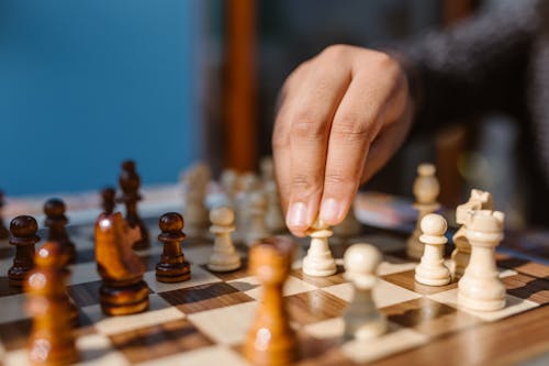 A Person Playing Chess Game