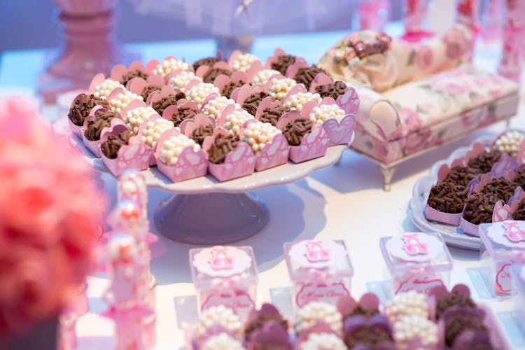 Cake Stands And Plates Full Of Sweets