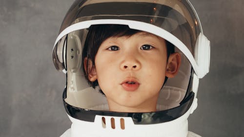 Free A Boy Wearing Astronaut Helmet Stock Photo