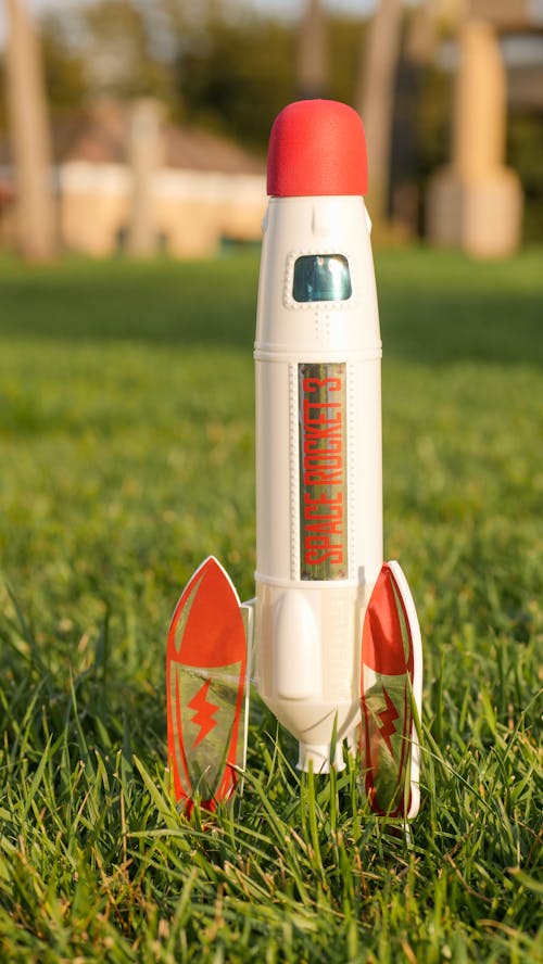 Close-Up Shot of a Rocket on the Grass