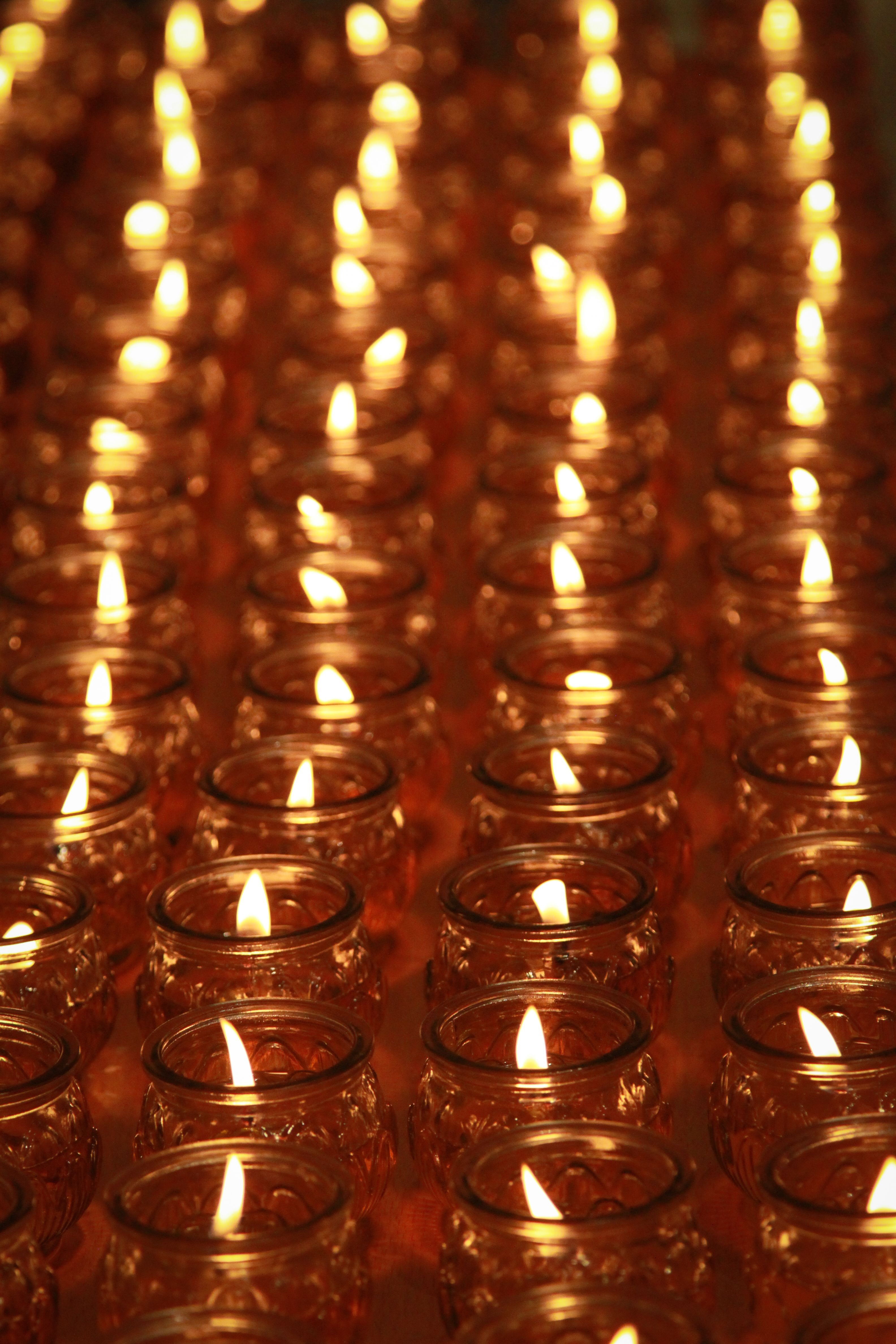 Burning Candles in Glass Jars Lined Up · Free Stock Photo