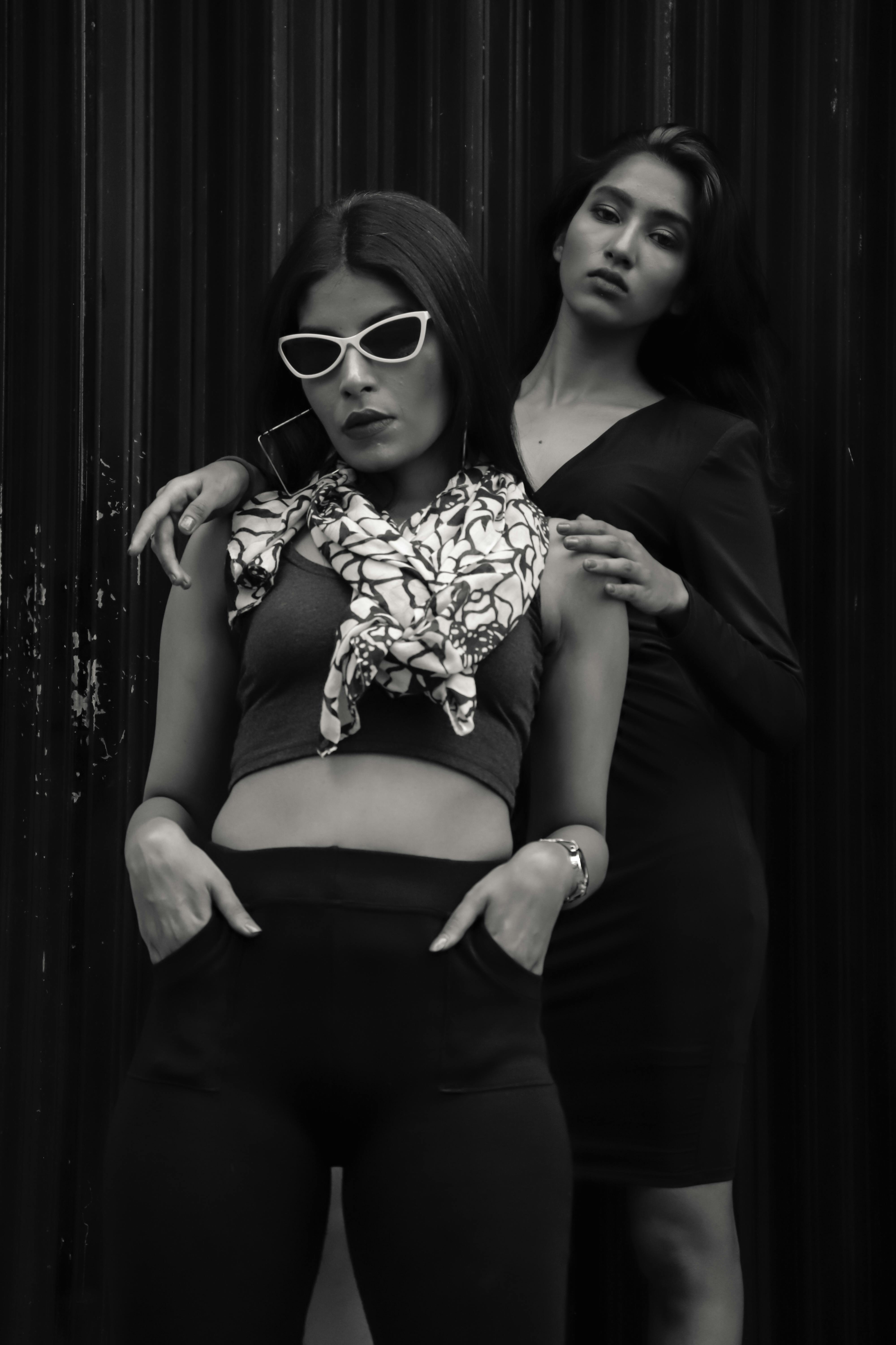 Woman in Black Crop Top and Black Skirt