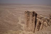 Adventurers on top of the Narrow Escarpment of Tuwaiq Plateau