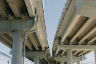 White Concrete Bridge Under the Blue Sky