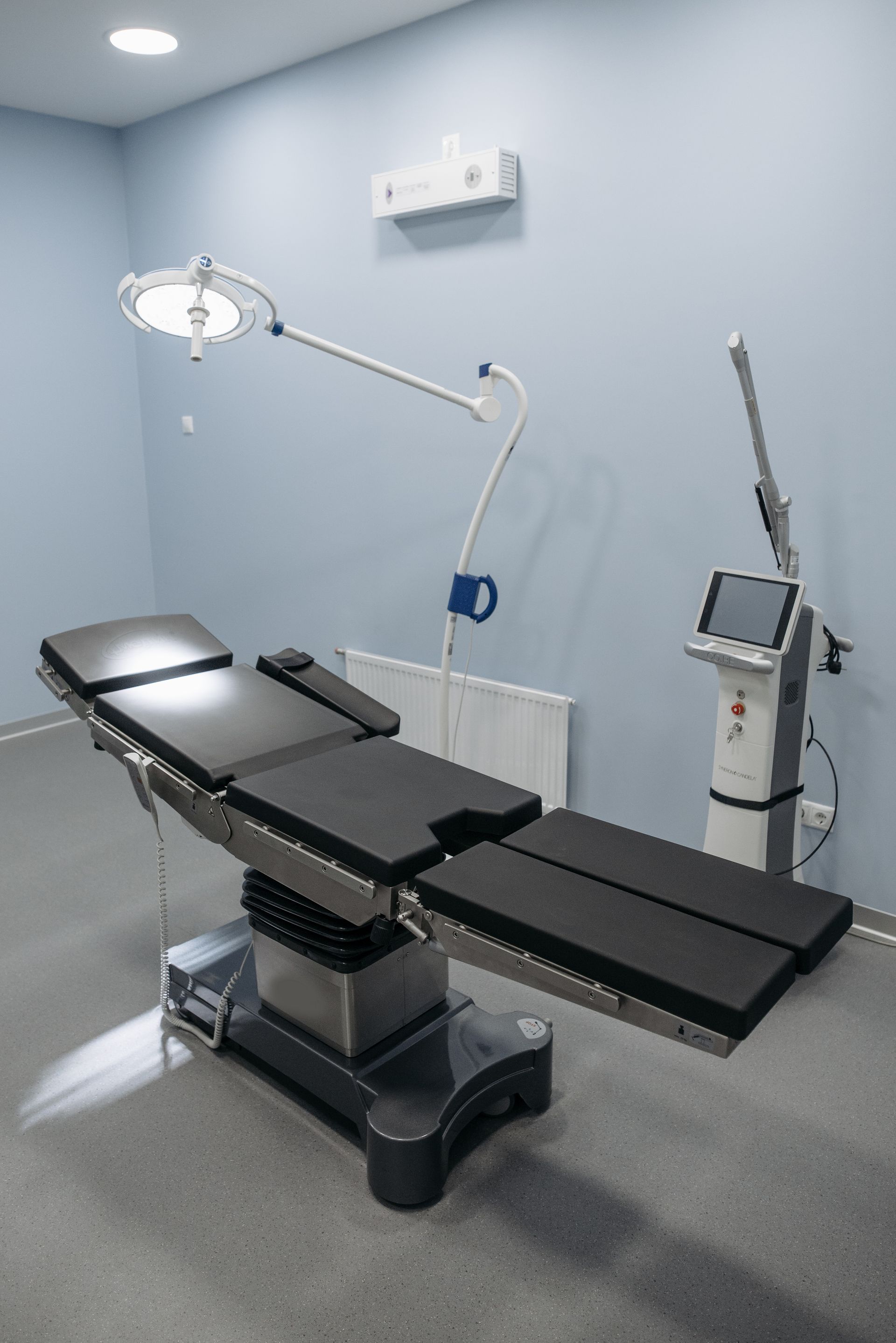 State-of-the-art operating room with surgical table and equipment