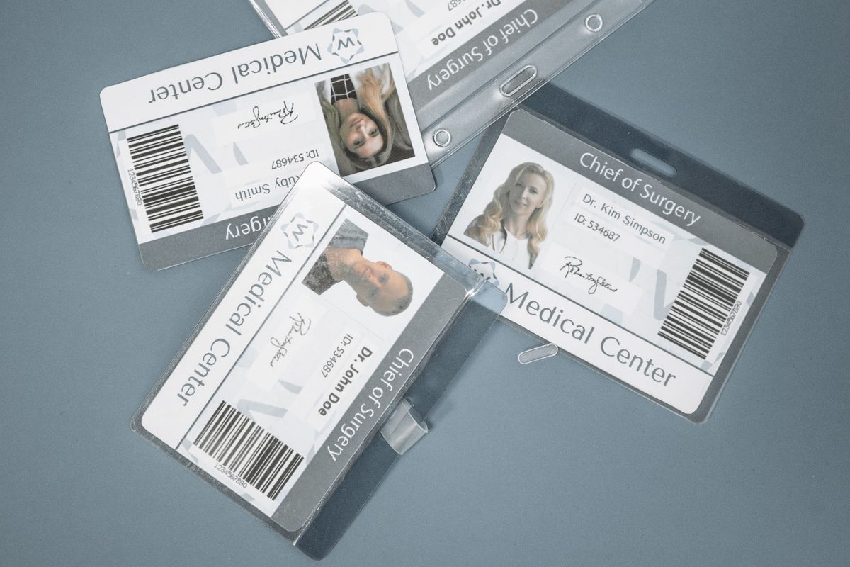 Identity and medical cards laid out on a surface