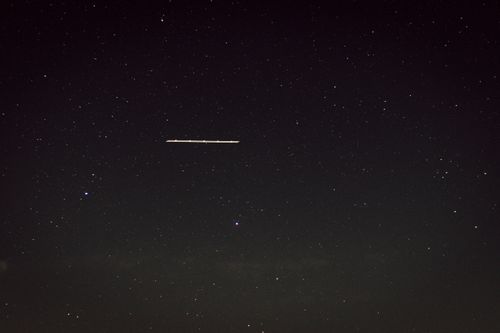 Free Captivating star-filled night sky with a mysterious line of light, captured in Germany. Stock Photo