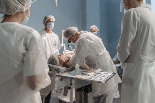 Doctor Performing an Operation on Patient