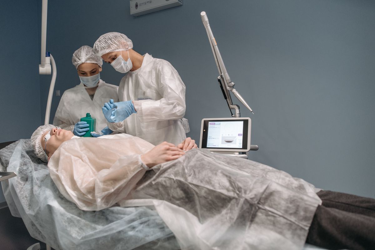 Medical professionals consulting with a patient in a clean clinic setting