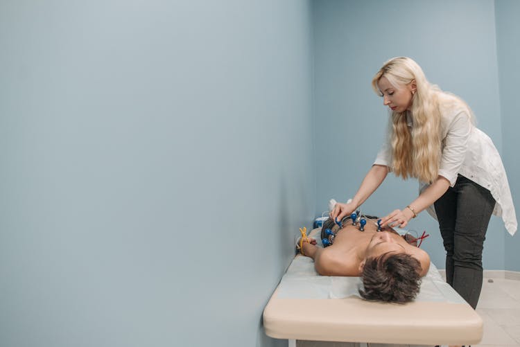 A Patient Getting An ECG At A Clinic