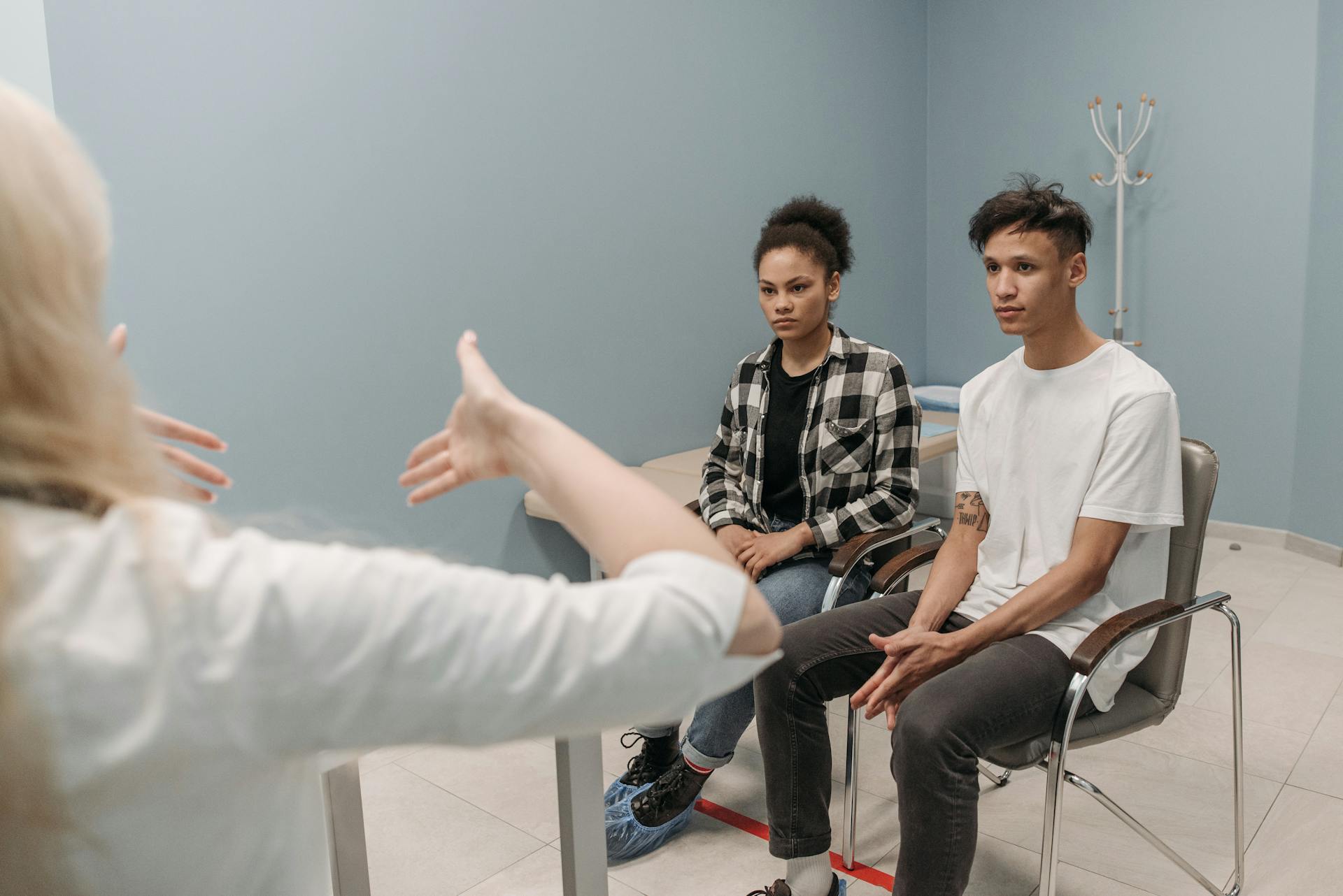 A Couple Sitting in the Clinic