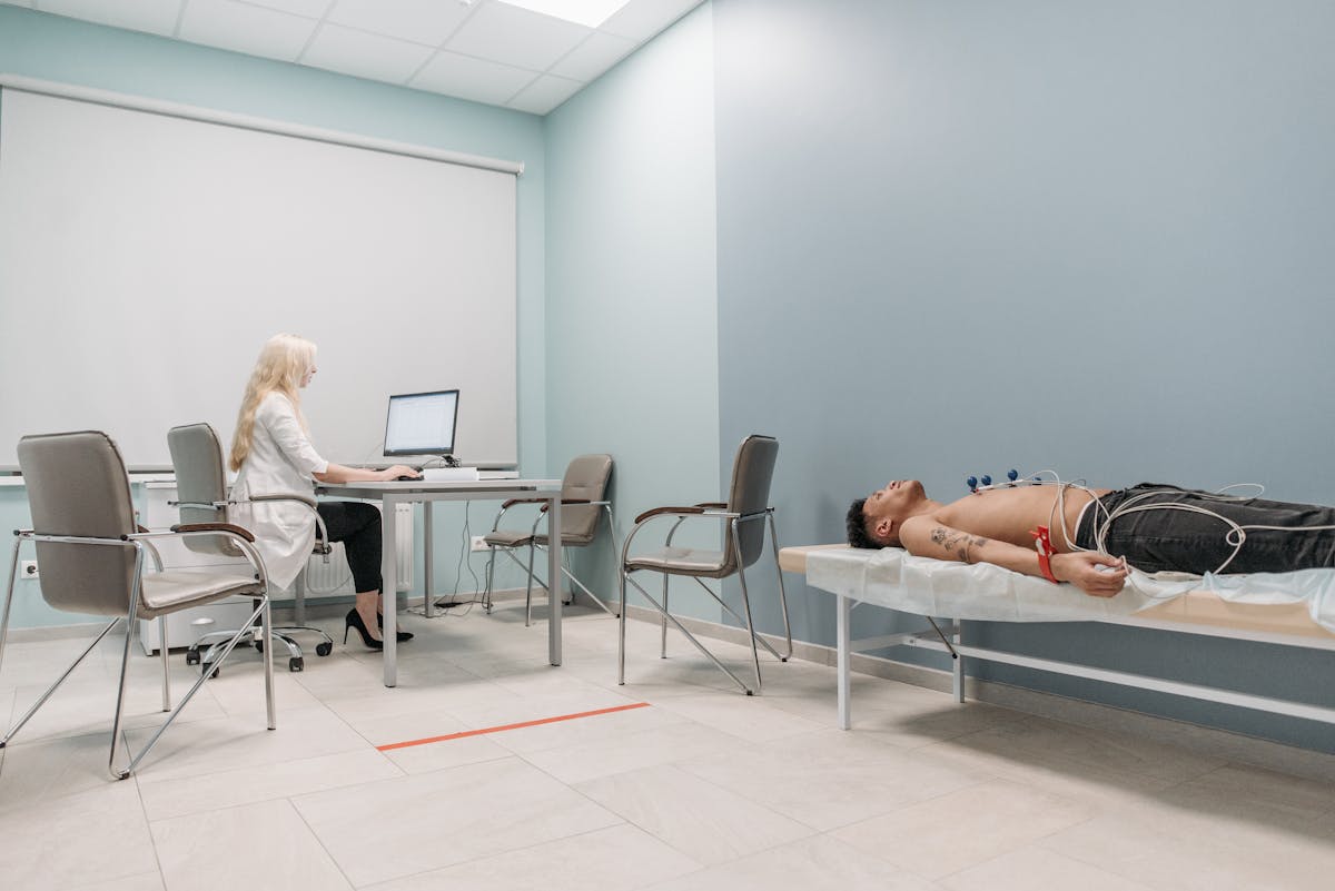 Parent holding a child’s hand during a clinic visit