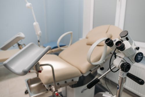 Binoculars by Chair for Patient in Examination Room