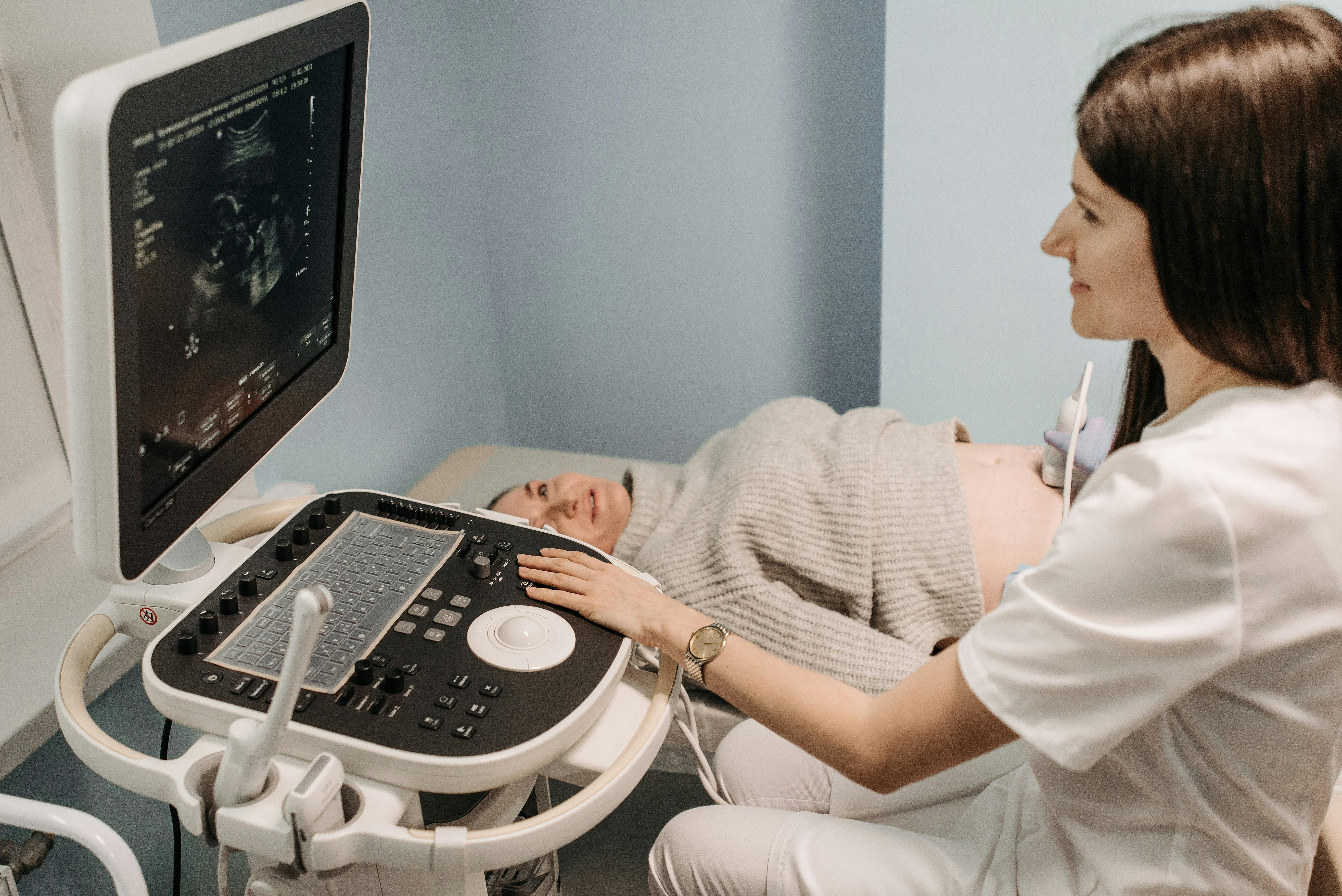 Planning how to open an elective ultrasound business in Georgia — entrepreneur reviewing startup steps at a desk