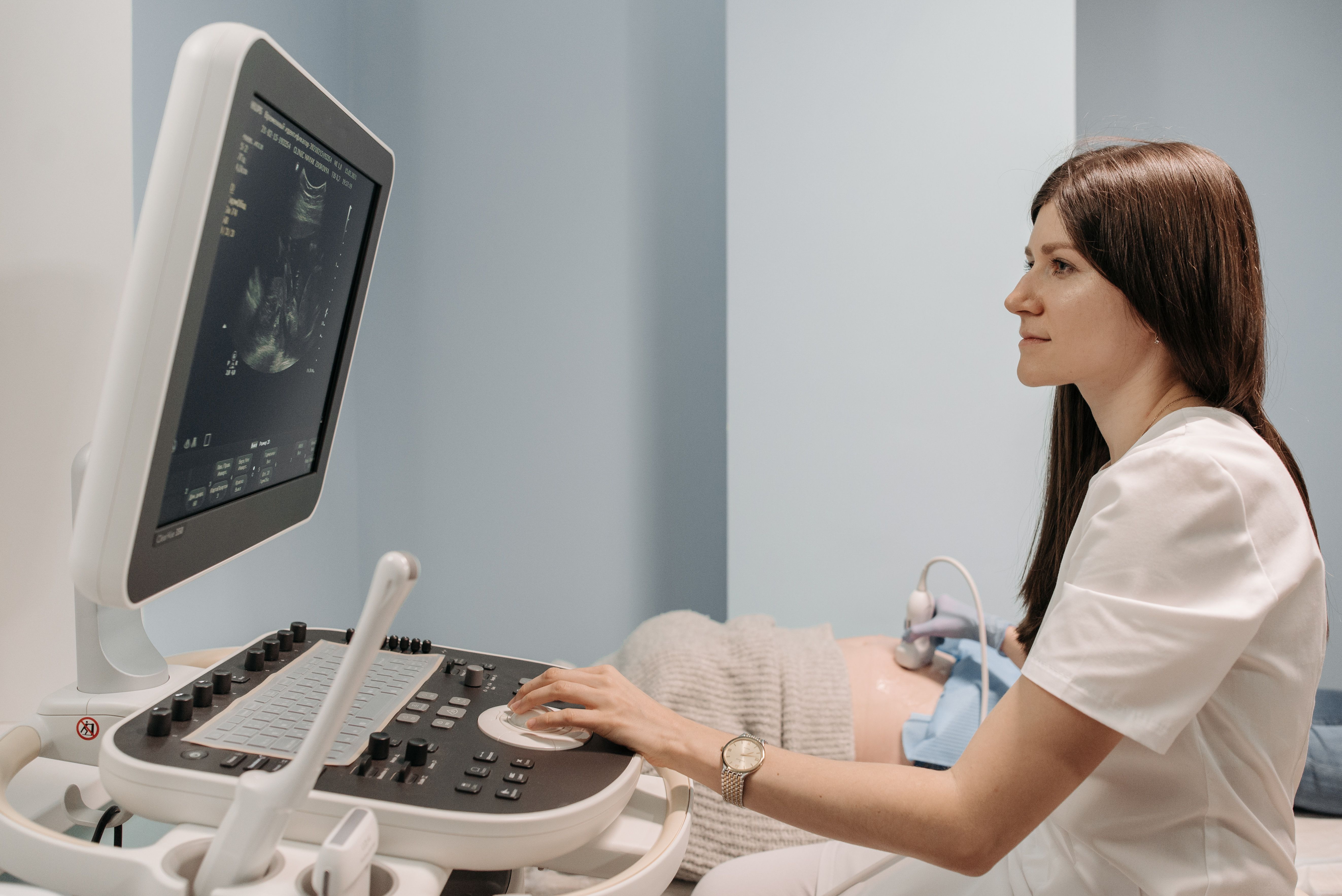 Warm photography studio interior representing the addition of ultrasound equipment for a Norfolk studio