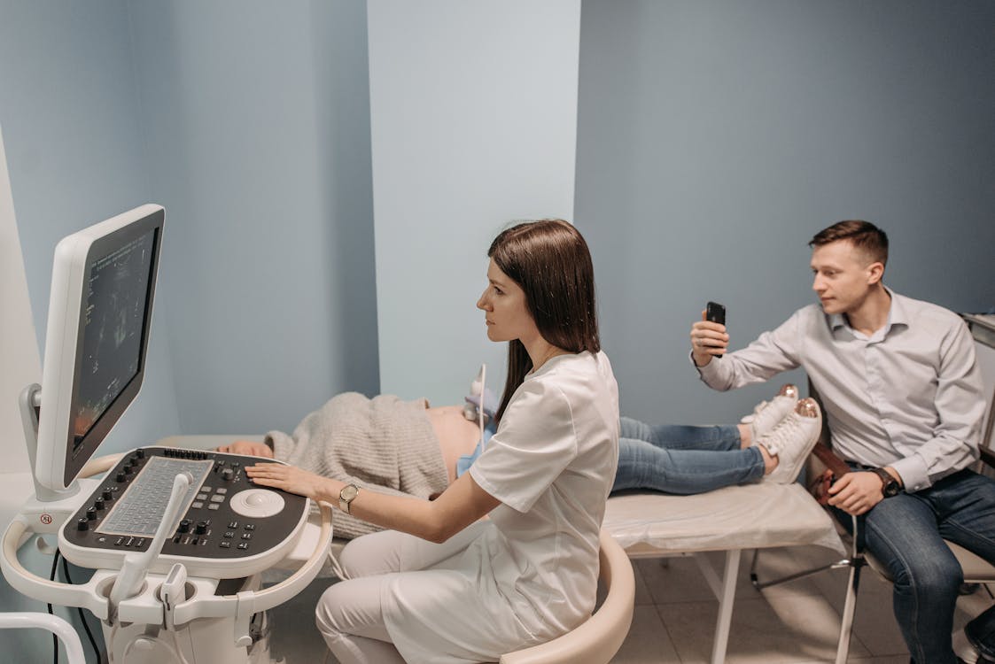 A Doctor Looking at an Ultrasound