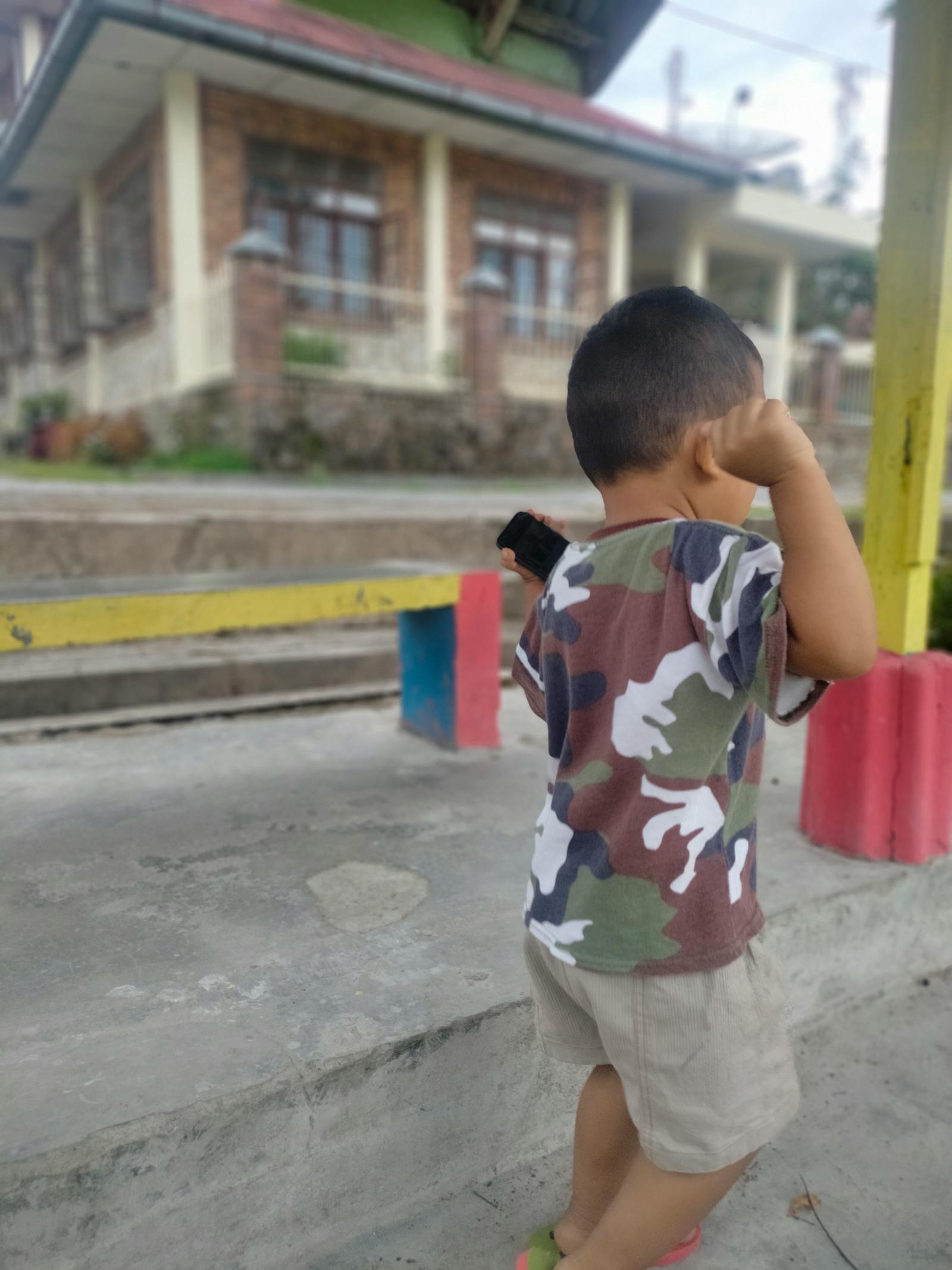 Person writing health notes and symptoms before a medical appointment