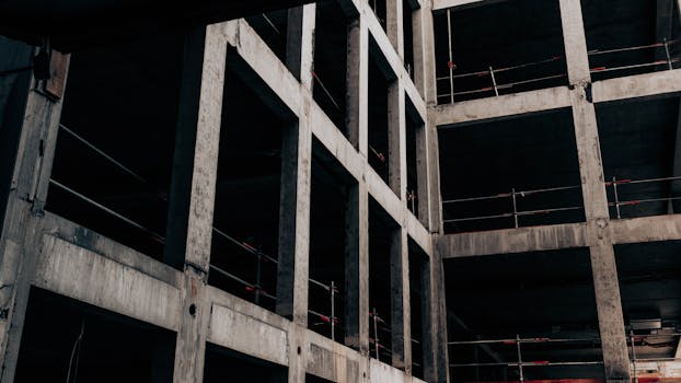 Structural concrete framework of a multistory building under construction.