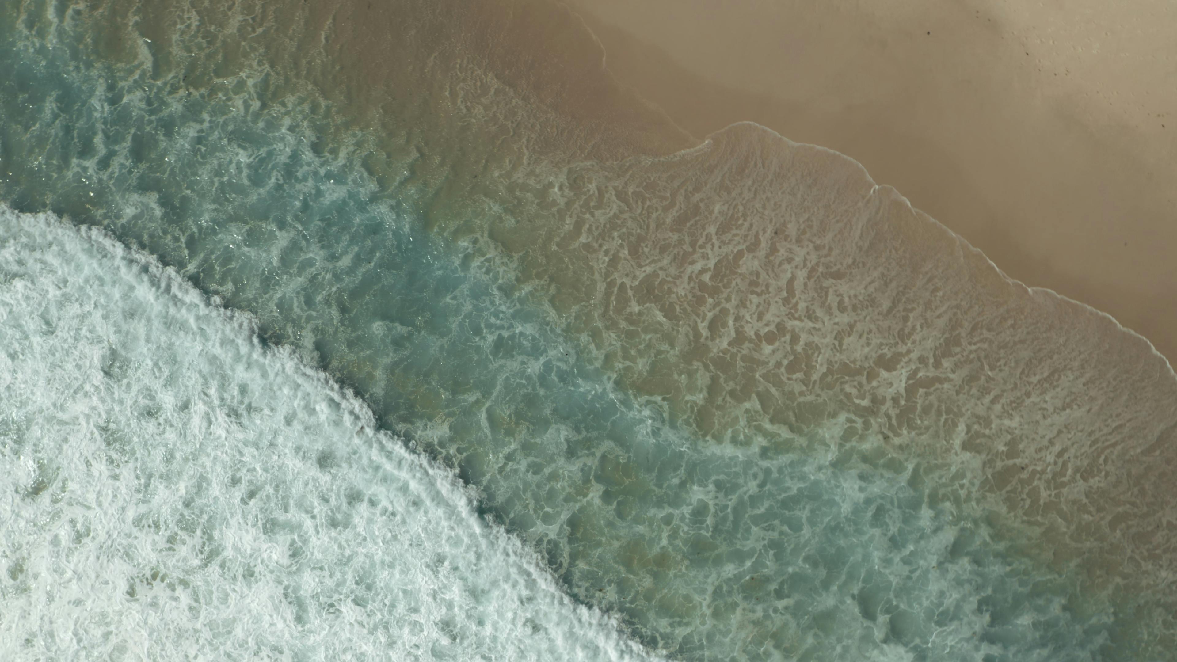 Waves Crashing on a Beach · Free Stock Photo