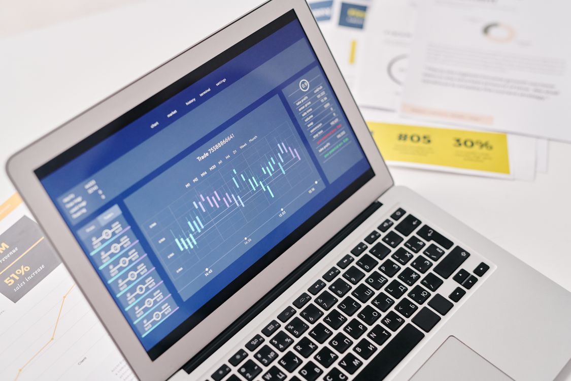 social media analytics and performance metrics report on laptop