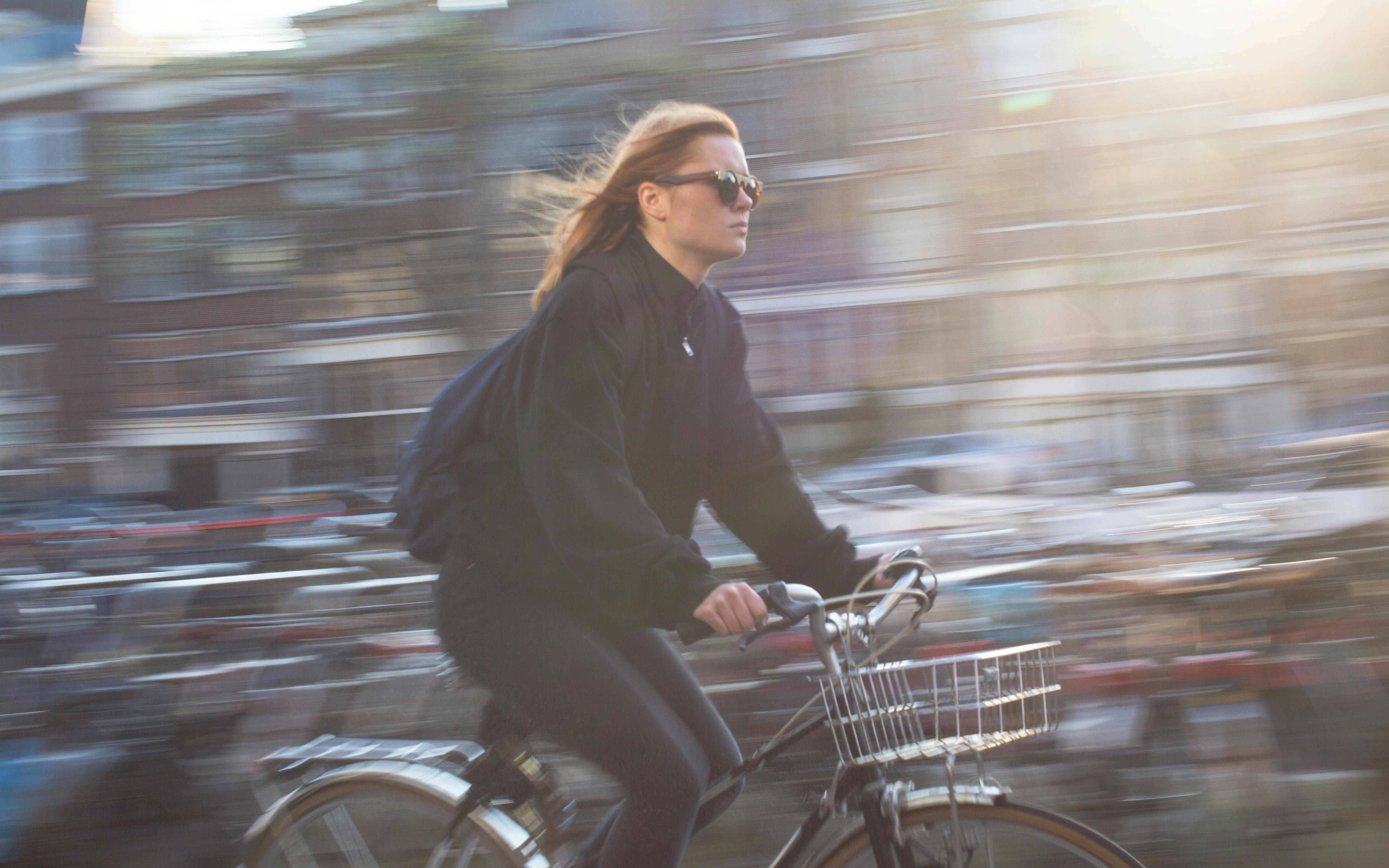 Woman Riding Bicycle Free Stock Photo