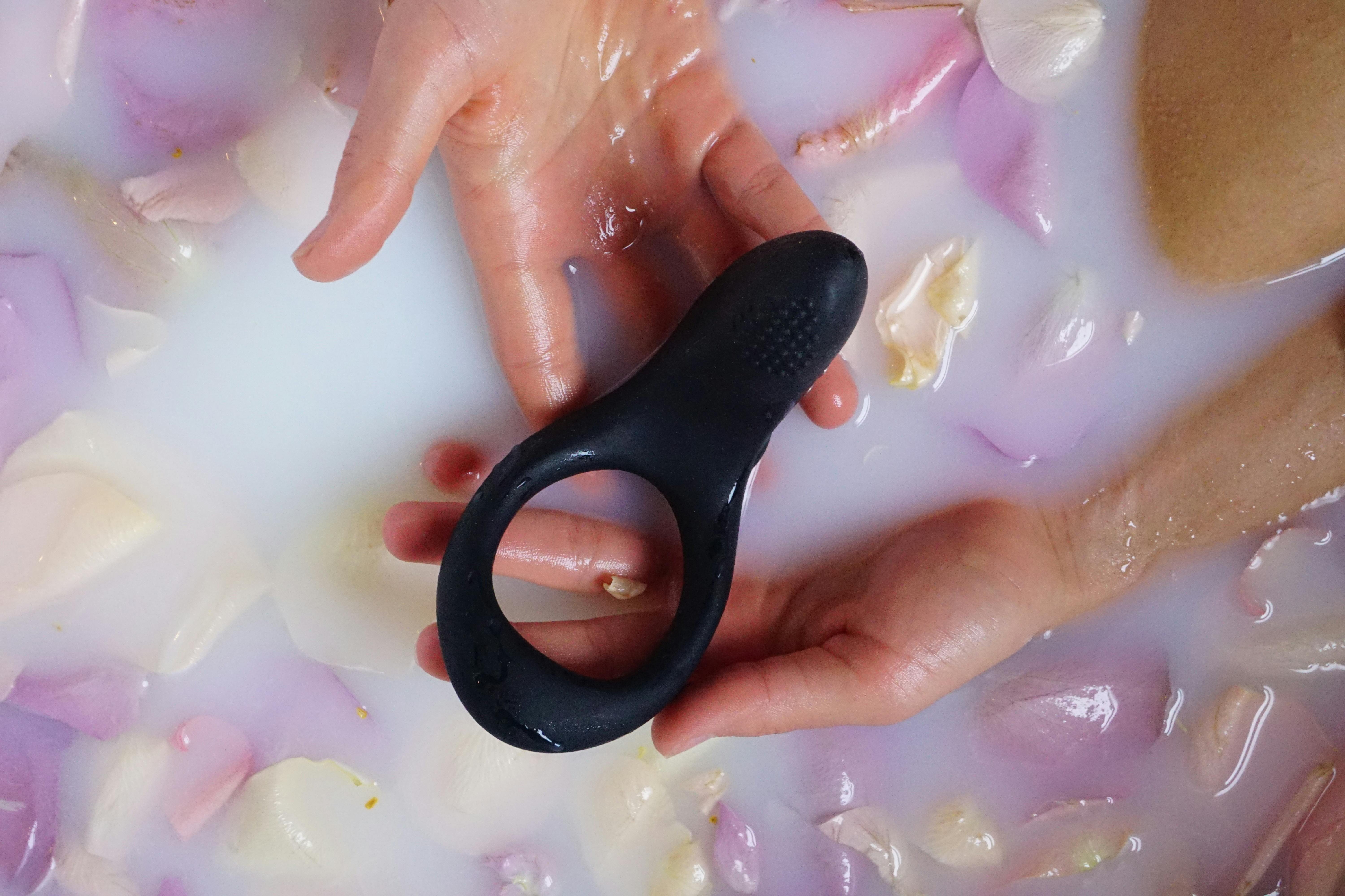 Lasso-style adjustable cock ring mechanism showing the slider and soft silicone strap