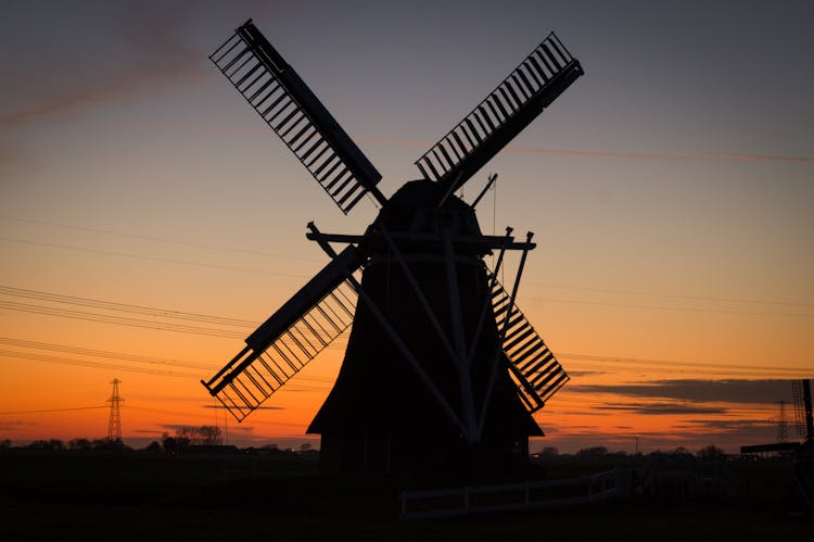 Silhouette Of Windmill During Dusk