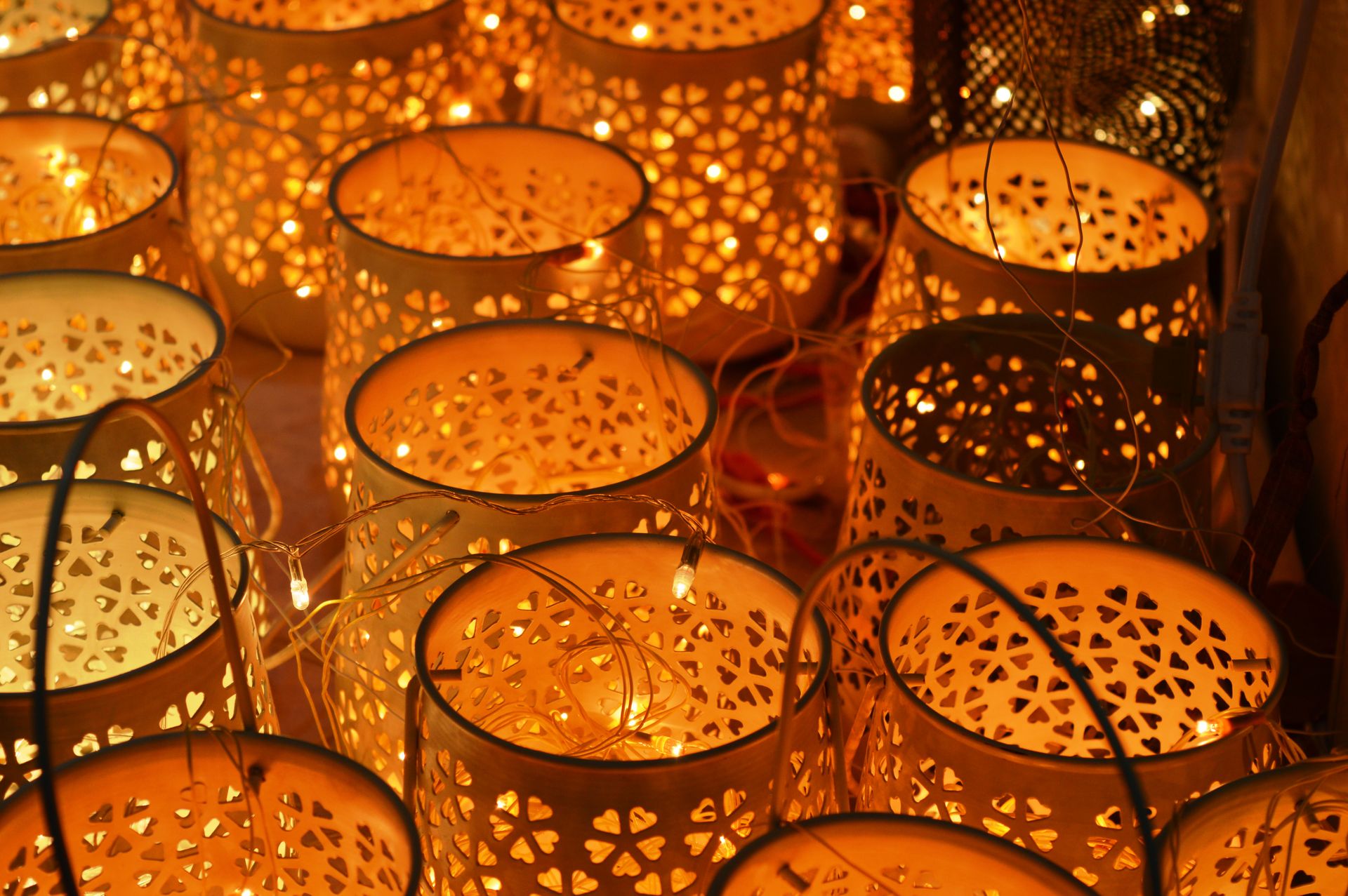 Elegant lattice lanterns with glowing lights creating a warm ambiance.