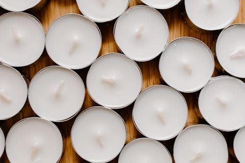 Tealight Candles on Wooden Surface