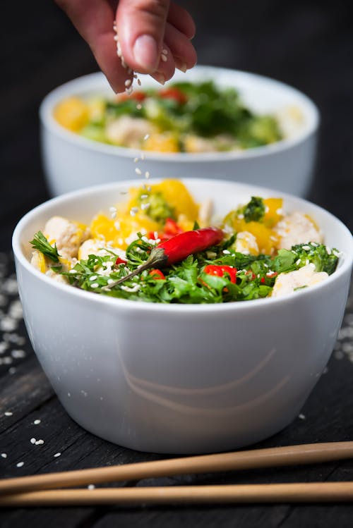 Close-Up Shot of Vegetable Salad in a White Ceramic Bowl