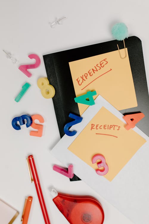 Free Sticky Notes and Plastic Numbers on Table Stock Photo