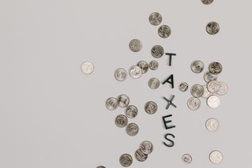Ingyenes stockfotó adók, érmék, fehér felület témában