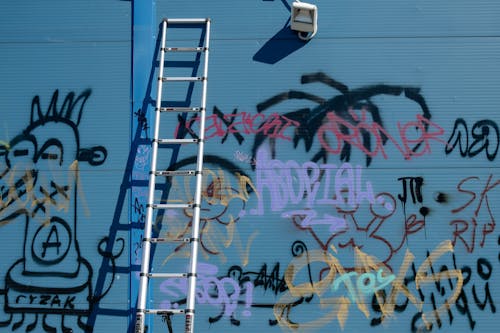 Free A Ladder on a Graffiti Wall Stock Photo
