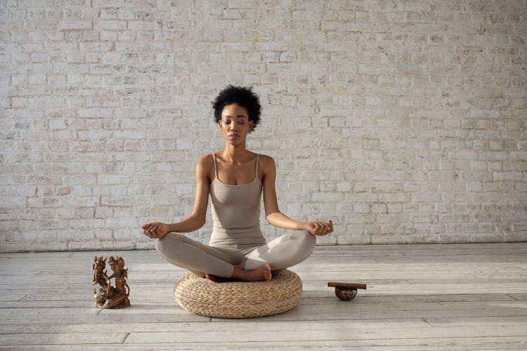 A Woman Doing A Yoga Exercise