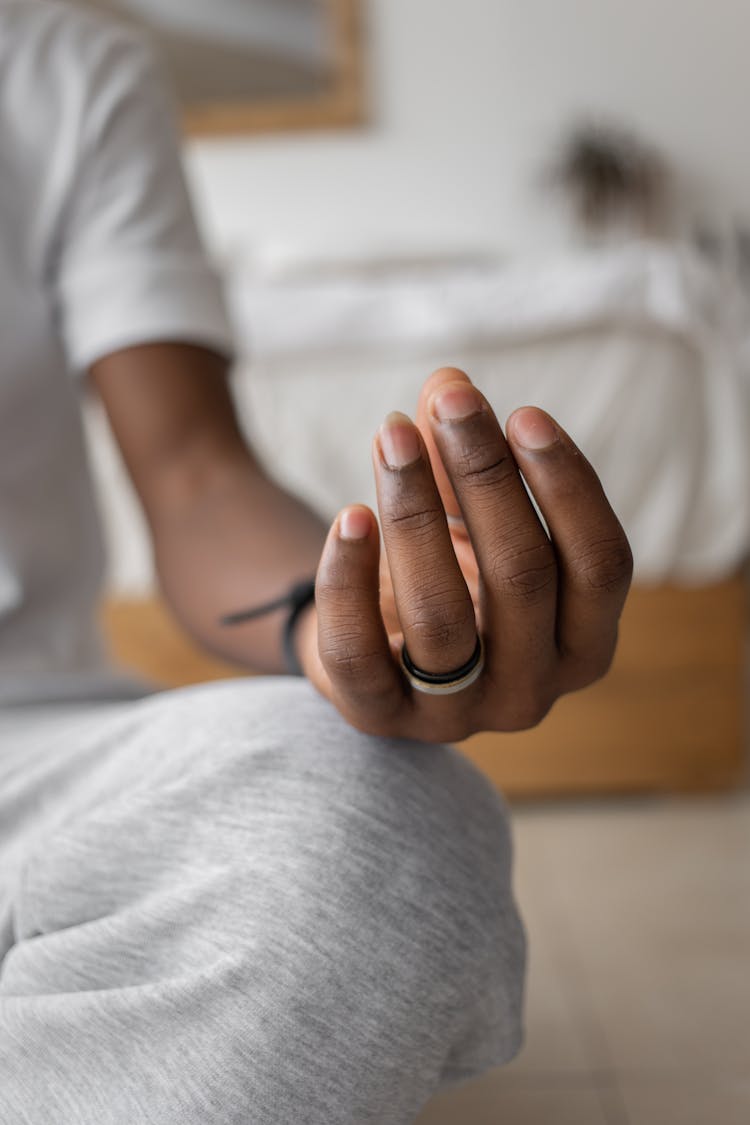 Hand Of A Person Wearing A Band