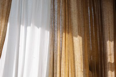 Sunlight through textured curtains — photo by cottonbro studio on Pexels