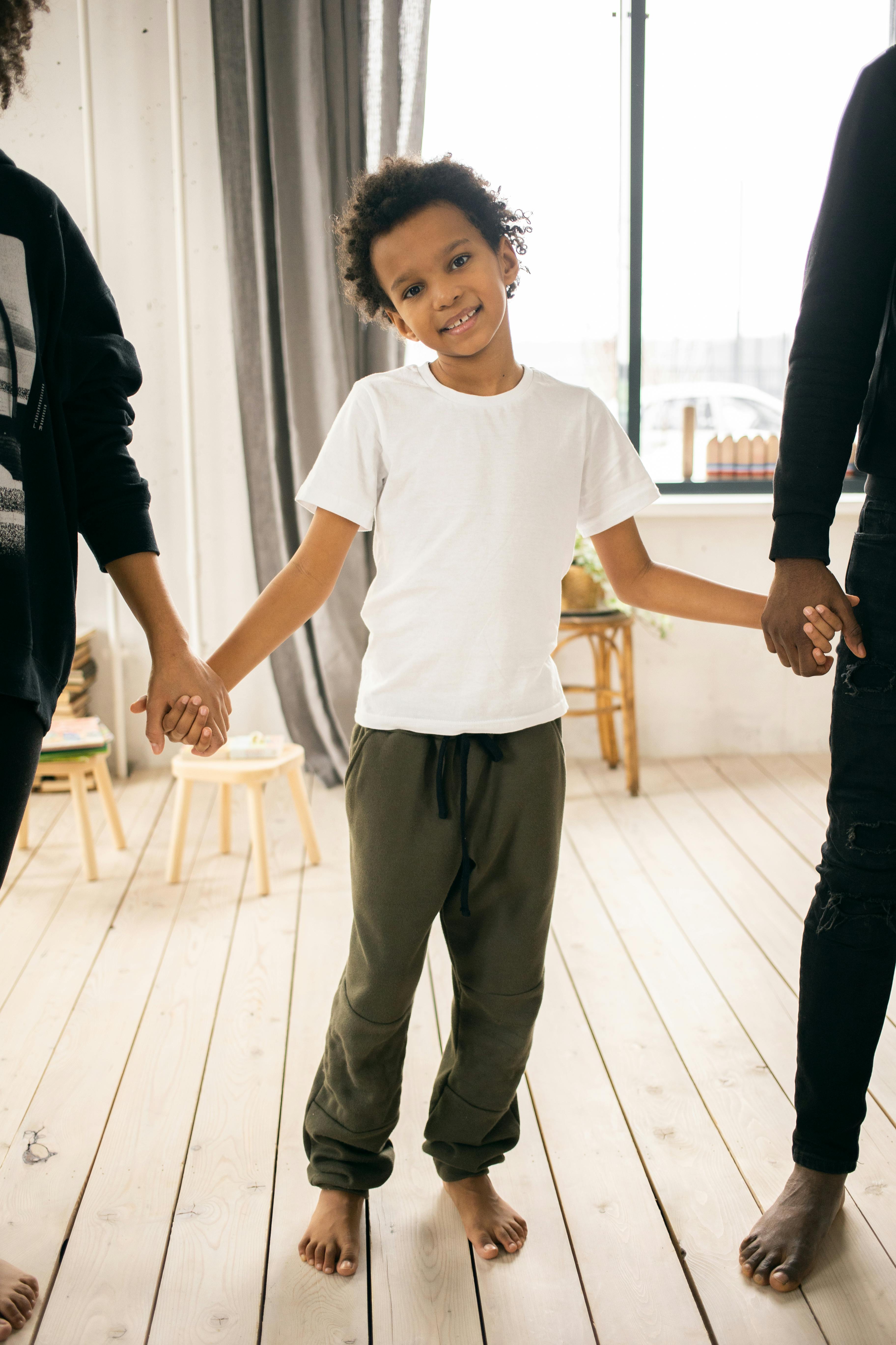 black boy with anonymous family