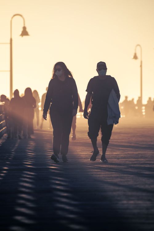Silhouette of People Walking on the Street during Sunset · Free Stock Photo
