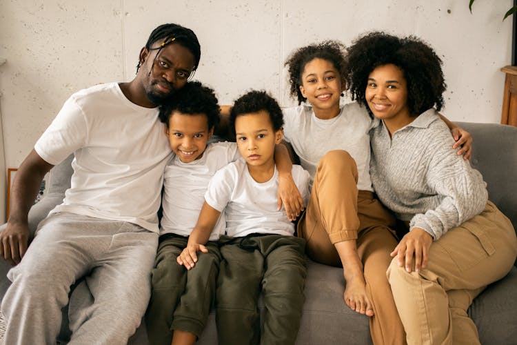 Happy Black Family On Couch