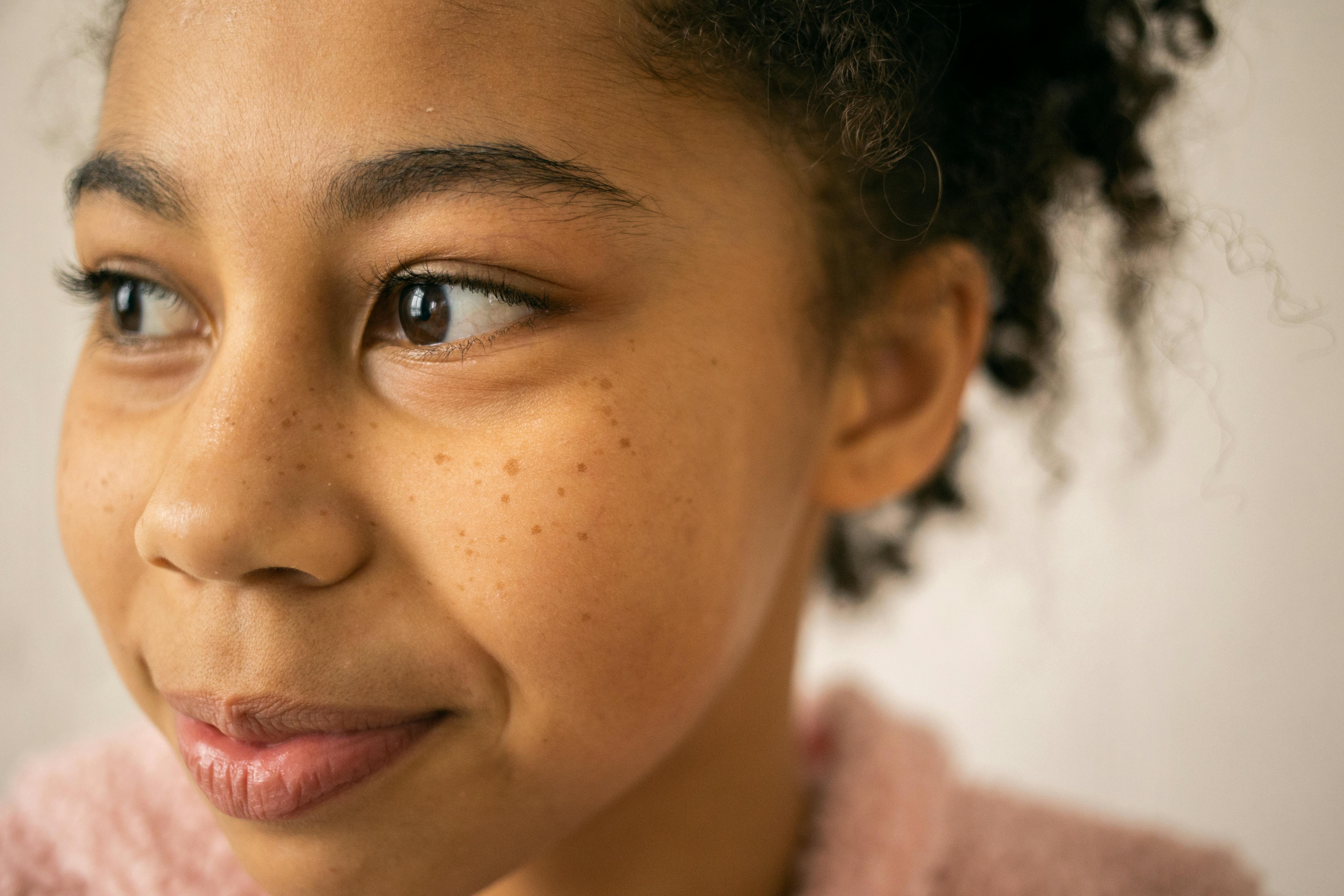 delighted black girl with freckles